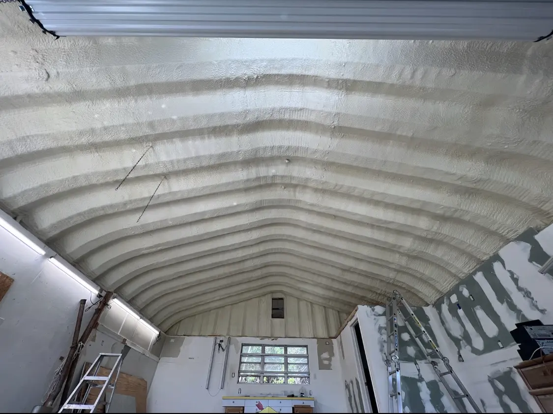 Spray polyurethane foam applied to the underside of a metal roof deck in Palmetto Bay